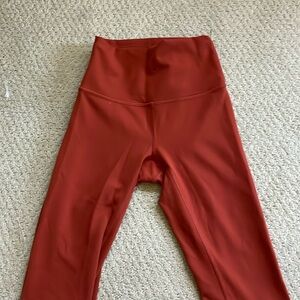 Burnt orange Lululemon leggings size 2 long barely worn